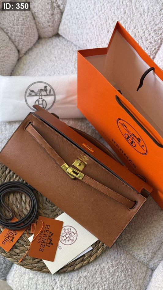 شنطة - Hermes kelly cut clutch swift / شامل كيس الشركة كواليتي ماستر
