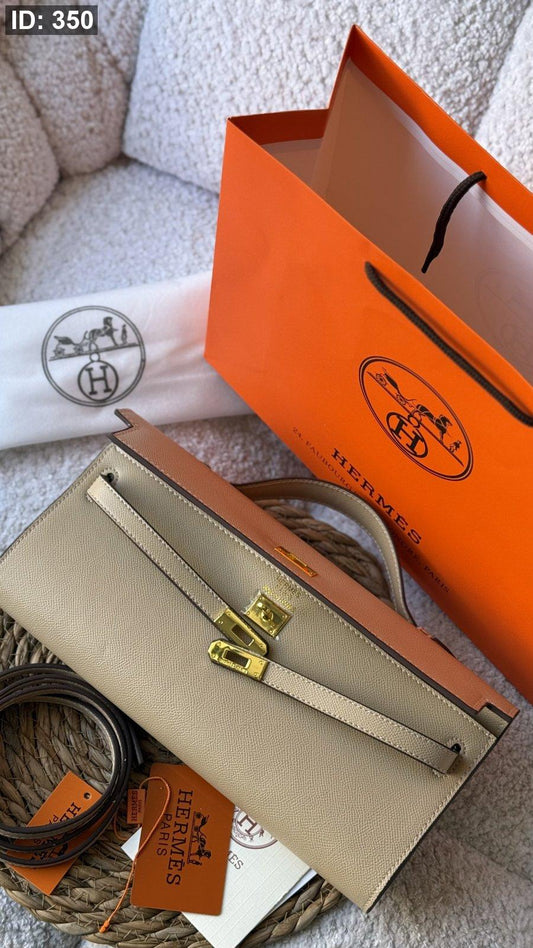 شنطة - Hermes kelly cut clutch swift / شامل كيس الشركة كواليتي ماستر