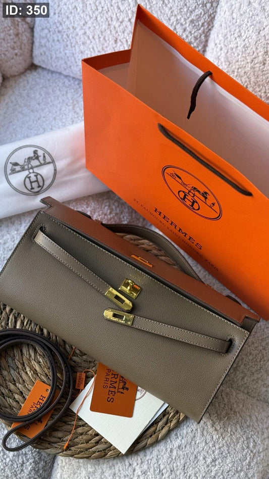 شنطة - Hermes kelly cut clutch swift / شامل كيس الشركة كواليتي ماستر