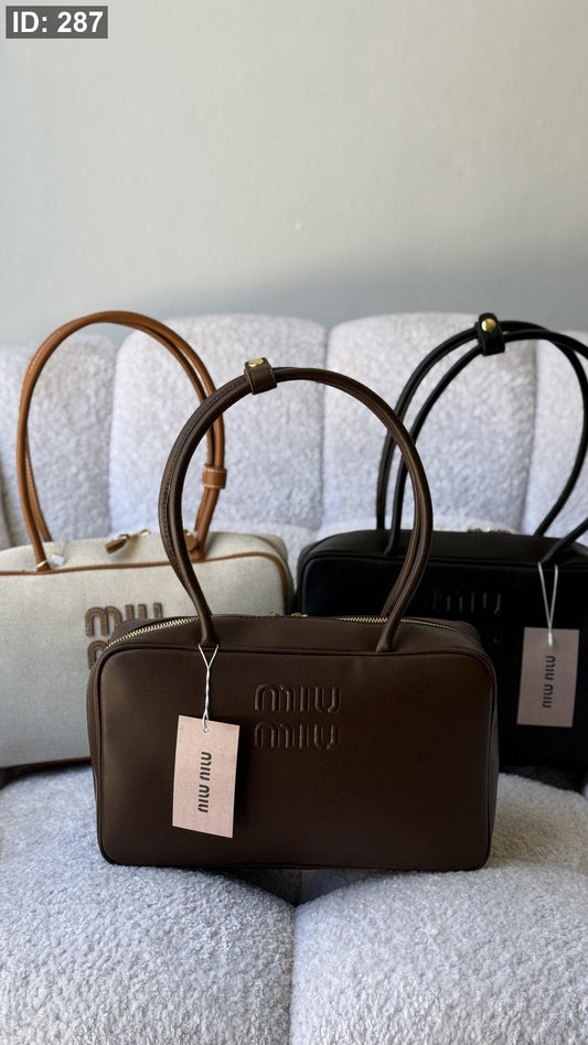 شنطة - MIU MIU Beau leather top-handle / غير شامل علبة