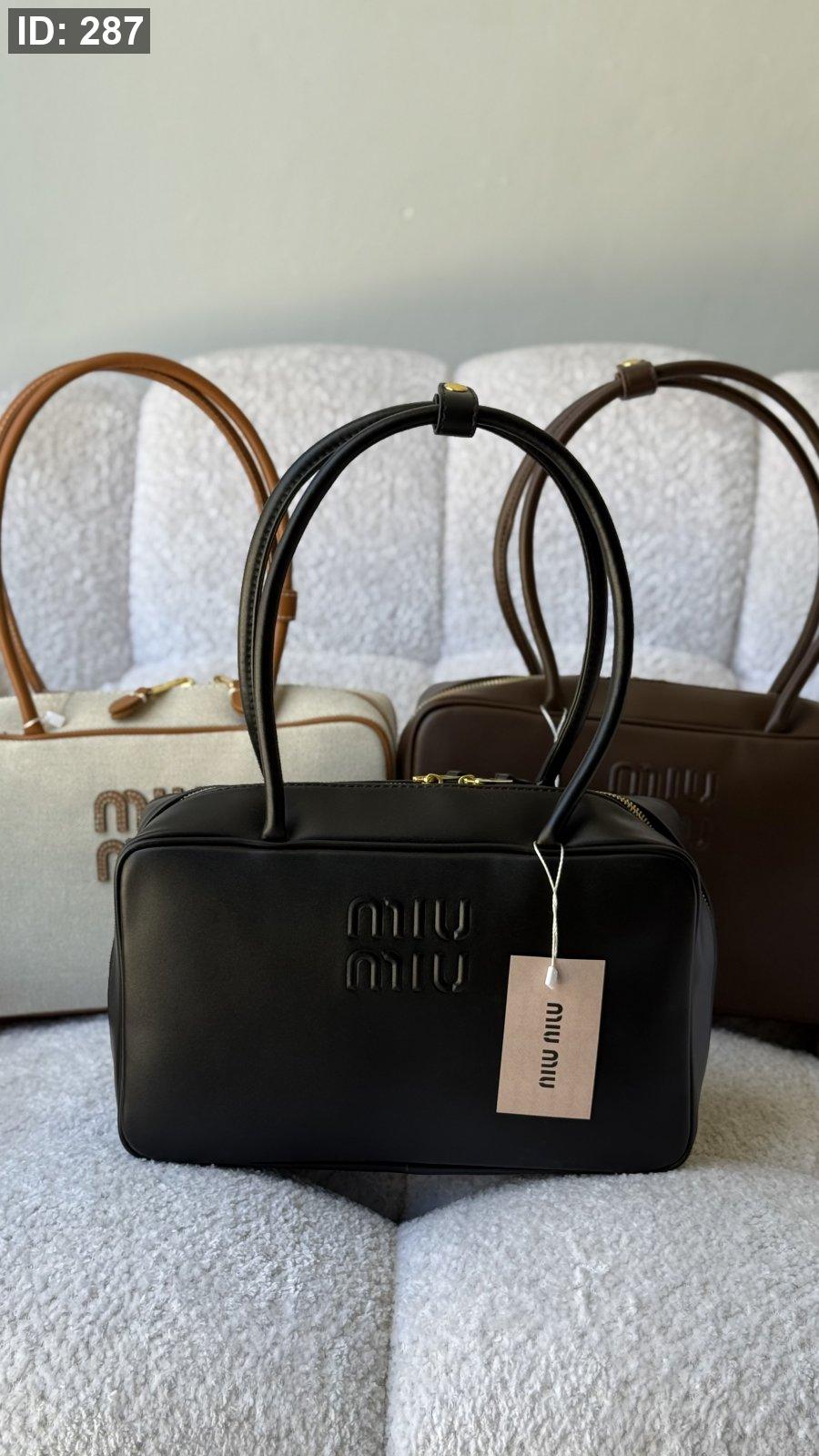 شنطة - MIU MIU Beau leather top-handle / غير شامل علبة