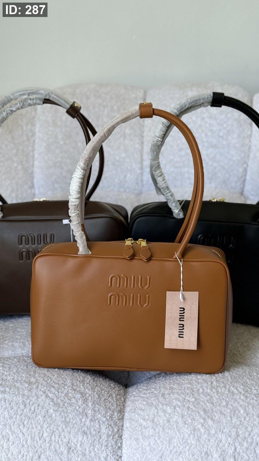 شنطة - MIU MIU Beau leather top-handle / غير شامل علبة