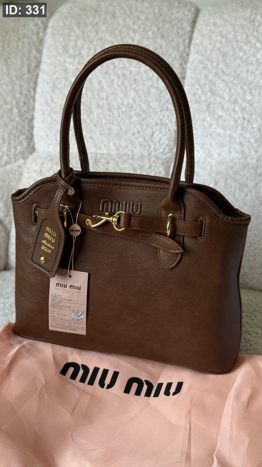 شنطة - Miu Miu Aventure nappa leather bag كواليتي ماستر - قاعدة 30 cm