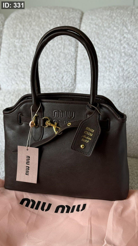 شنطة - Miu Miu Aventure nappa leather bag كواليتي ماستر - قاعدة 30 cm