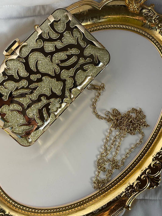 شنطة مناسبات ذهبي - شامل سلسلة طويلة